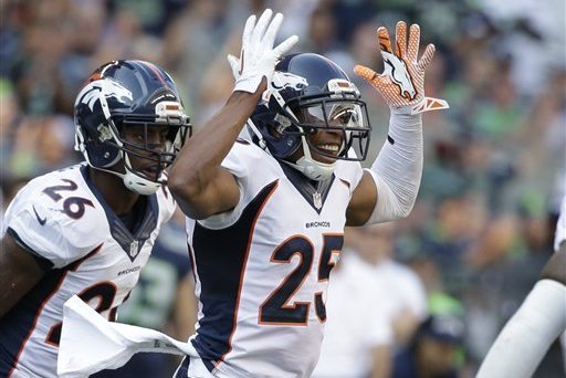 Denver Broncos cornerback Chris Harris (25) takes part in drills during an  NFL football trainin …