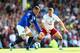 LIVERPOOL, ENGLAND - OCTOBER 18: Ross Barkley of Everton is challenged by Tom Cleverley of Aston Villa during the Barclays Premier League match between Everton and Aston Villa at Goodison Park on October 18, 2014 in Liverpool, England. (Photo by Jan Kru
