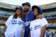 Sep 2, 2014; Los Angeles, CA, USA; Entertainer and actress Queen Latifah (left), Los Angeles Dodgers center fielder Matt Kemp (center) and Taney Dragons little league world series pitcher Mo'Ne Davis pose before the game against the Washington Nationals a