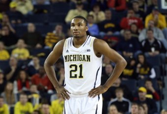 ANN ARBOR, MI - NOVEMBER 29: Zak Irvin #21 of the Michigan Wolverines looks to the bench during the second half of the game against Coppin State Eagles at Crisler Center on November 29, 2013 in Ann Arbor, Michigan.  (Photo by Leon Halip/Getty Images)