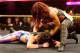Becky Lynch attacks Bayley.