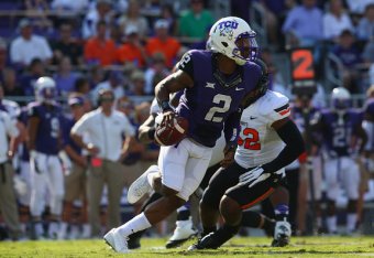 FORT WORTH, TX - OCTOBER 18:  Trevone Boykin #2 of the TCU Horned Frogs throws against the Oklahoma State Cowboys at Amon G. Carter Stadium on October 18, 2014 in Fort Worth, Texas.  (Photo by Ronald Martinez/Getty Images)
