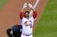 ST LOUIS, MO - OCTOBER 12: Oscar Taveras #18 of the St. Louis Cardinals celebrates hitting a solo home run in the seventh inning against the San Francisco Giants during Game Two of the National League Championship Series at Busch Stadium on October 12, 2