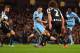 MANCHESTER, ENGLAND - OCTOBER 29: Yaya Toure of Manchester City shoots Referee Anthony Taylor goal during the Capital One Cup Fourth Round match between Manchester City and Newcastle United at Etihad Stadium on October 29, 2014 in Manchester, England. (P