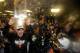 KANSAS CITY, MO - OCTOBER 29: Bruce Bochy #15 of the San Francisco Giants celebrates with The Commissioner's Trophy in the locker room after a 3-2 win over the Kansas City Royals in Game Seven of the 2014 World Series at Kauffman Stadium on October 29, 2