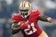 ARLINGTON, TX - SEPTEMBER 07: Frank Gore #21 of the San Francisco 49ers carries the ball against the Dallas Cowboys in the first half at AT&T Stadium on September 7, 2014 in Arlington, Texas. (Photo by Christian Petersen/Getty Images)
