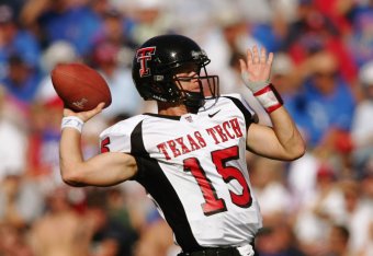KANSAS CITY, MO - SEPTEMBER 25:  Quarterback Sonny Cumbie #15 of the Texas Tech Red Raiders against the University of Kansas Jayhawks during the Big 12 Conference Game at Memorial Stadium on September 25, 2004 in Kansas City, Missouri.  The Red Raiders de
