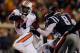 OXFORD, MS - NOVEMBER 01: Quarterback Nick Marshall #14 of the Auburn Tigers rushes 2 yards for a touchdown against Chief Brown #8 of the Mississippi Rebels as the Rebels held a 24-21 lead in the third quarter at Vaught-Hemingway Stadium on November 1, 2