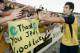 GOSFORD, AUSTRALIA - DECEMBER 31: Mile Jedinak of the Mariners farewells fans after playing his final match for the Mariners after the round 18 A-League match between the Central Coast Mariners and the Perth Glory at Bluetongue Stadium on December 31, 20