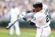 Sep 28, 2014; Seattle, WA, USA; Seattle Mariners second baseman Robinson Cano (22) hits against the Los Angeles Angels during the first inning at Safeco Field. Mandatory Credit: Joe Nicholson-USA TODAY Sports