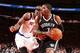 NEW YORK, NY - APRIL 02: Joe Johnson #7 of the Brooklyn Nets drives to the basket against Amar'e Stoudemire #1 of the New York Knicks at Madison Square Garden in New York City on April 02, 2014. NOTE TO USER: User expressly acknowledges and agrees that,
