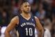 Feb 10, 2014; Toronto, Ontario, CAN; New Orleans Pelicans guard Eric Gordon (10) looks on against the Toronto Raptors at Air Canada Centre. The Raptors beat the Pelicans 108-101. Mandatory Credit: Tom Szczerbowski-USA TODAY Sports