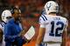 DENVER, CO - SEPTEMBER 07: Indianapolis Colts offensive coordinator Pep Hamilton talks with quarterback Andrew Luck #12 of the Indianapolis Colts during a time out against the Denver Broncos at Sports Authority Field at Mile High on September 7, 2014 in