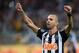 Diego Tardelli celebrates Atletico's progress at the expense of Flamengo.