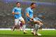 MANCHESTER, ENGLAND - MAY 07: Edin Dzeko of Manchester City celebrates scoring the opening goal with Samir Nasri (L) during the Barclays Premier League match between Manchester City and Aston Villa at Etihad Stadium on May 7, 2014 in Manchester, England.