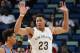 NEW ORLEANS, LA - OCTOBER 16: Jeremy Lamb #11 of the Oklahoma City Thunder handles the ball against Anthony Davis #23 of the New Orleans Pelicans during an NBA game on October 16, 2014 at the Smoothie King Center in New Orleans, Louisiana. NOTE TO USER: U