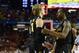 Ron Baker, left, talks to former teammate Malcolm Armstead. Armstead was the starting point guard on WSU's Final Four team.