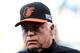 KANSAS CITY, MO - OCTOBER 14: Buck Showalter #26 of the Baltimore Orioles looks on during batting practice prior to Game Three of the American League Championship Series against the Kansas City Royals at Kauffman Stadium on October 14, 2014 in Kansas Cit