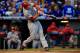 KANSAS CITY, MO - OCTOBER 05: Mike Trout #27 of the Los Angeles Angels hits a home run in the first inning against the Kansas City Royals during Game Three of the American League Division Series at Kauffman Stadium on October 5, 2014 in Kansas City, Misso