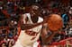 MIAMI, FL - NOVEMBER 2: Luol Deng #9 of the Miami Heat handles the ball against the Toronto Raptors during the game on November 2, 2014 at AmericanAirlines Arena in Miami, Florida. NOTE TO USER: User expressly acknowledges and agrees that, by downloading