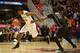 SAN DIEGO, CA - DECEMBER 8: Winston Shepard #13 of the San Diego State Aztecs dribbles the ball and is fouled in the second half of the game by Mike Anderson #11 of the Washington Huskies at the Viejas Arena on December 8, 2013 in San Diego, California.