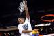 NEW ORLEANS, LA - APRIL 09: Kaleena Mosqueda-Lewis #23 of the Connecticut Huskies, cuts down the net following a victory over the Louisville Cardinals in the National Final game of the 2013 NCAA Division I Women's Basketball Championship at New Orleans A