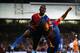 LONDON, ENGLAND - MAY 05: Dwight Gayle #16 (R) of Crystal Palace celebrates with teammate Yannick Bolasie after scoring his team's third goal to level the scores at 3-3 during the Barclays Premier League match between Crystal Palace and Liverpool at Selh