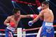MACAU - NOVEMBER 23: Manny Pacquiao of the Philippines punches Chris Algieri of the United States during the WBO world welterweight title at The Venetian on November 23, 2014 in Macau, Macau. (Photo by Chris Hyde/Getty Images)
