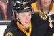 BOSTON, MA - NOVEMBER 24 : David Pastrnak #88 of the Boston Bruins passes the puck during warmups before the game against the Pittsburgh Penguins at the TD Garden on November 24, 2014 in Boston, Massachusetts. (Photo by Steve Babineau/NHLI via Getty Imag