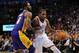 Mar 5, 2013; Oklahoma City, OK, USA; Oklahoma City Thunder forward Kevin Durant (35) handles the ball against Los Angeles Lakers forward Earl Clark (6) during the second half at Chesapeake Energy Arena. Mandatory Credit: Mark D. Smith-USA TODAY Sports