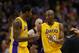 Jan. 30, 2013; Phoenix, AZ, USA: Los Angeles Lakers guard Kobe Bryant (24) talks with forward Earl Clark against the Phoenix Suns at the US Airways Center. Mandatory Credit: Mark J. Rebilas-USA TODAY Sports