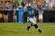 CHARLOTTE, NC - SEPTEMBER 21: Jonathan Stewart #28 of the Carolina Panthers runs the ball against the Pittsburgh Steelers in the 1st quarter during their game at Bank of America Stadium on September 21, 2014 in Charlotte, North Carolina. (Photo by Grant