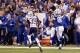 INDIANAPOLIS, IN - NOVEMBER 16: Coby Fleener #80 of the Indianapolis Colts makes a 45-yard reception against Brandon Browner #39 of the New England Patriots during the third quarter of the game at Lucas Oil Stadium on November 16, 2014 in Indianapolis,