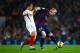 BARCELONA, SPAIN - NOVEMBER 22: Jeremy Mathieu of FC Barcelona competes for the ball with Denis Suarez of Sevilla FC during the La Liga match between FC Barcelona and Sevilla FC at Camp Nou on November 22, 2014 in Barcelona, Spain. (Photo by David Ramos