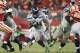 SANTA CLARA, CA - NOVEMBER 27: Marshawn Lynch #24 of the Seattle Seahawks runs up the middle against the San Francisco 49ers in the fourth quarter at Levi's Stadium on November 27, 2014 in Santa Clara, California. (Photo by Brian Bahr/Getty Images)