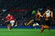 MANCHESTER, ENGLAND - NOVEMBER 29: Wayne Rooney of Manchester United scores their second goal during the Barclays Premier League match between Manchester United and Hull City at Old Trafford on November 29, 2014 in Manchester, England. (Photo by Matthew