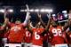 INDIANAPOLIS, IN - DECEMBER 06: Evan Spencer #6 (C), Adolphus Washington #92 (R) and the Ohio State Buckeyes celebrate after they defeated the Wisconsin Badgers 59-0 in the Big Ten Championship at Lucas Oil Stadium on December 6, 2014 in Indianapolis, In