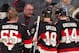 OTTAWA, CANADA - NOVEMBER 4: Head coach Paul MacLean of the Ottawa Senators talks to Sergei Gonchar #55, Jason Spezza #19 and Colin Greening #14 of the Ottawa Senators during a time-out during an NHL game against the Montreal Canadiens at Scotiabank Place
