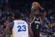 November 13, 2014; Oakland, CA, USA; Brooklyn Nets forward Kevin Garnett (2) shoots the basketball against Golden State Warriors forward Draymond Green (23) during the first quarter at Oracle Arena. Mandatory Credit: Kyle Terada-USA TODAY Sports