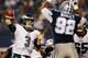 ARLINGTON, TX - NOVEMBER 27: Mark Sanchez #3 of the Philadelphia Eagles passes as Jeremy Mincey #92 of the Dallas Cowboys applies pressure in the second half at AT&T Stadium on November 27, 2014 in Arlington, Texas. (Photo by Tom Pennington/Getty Images