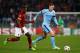 ROME, ITALY - DECEMBER 10: Edin Dzeko of Manchester City battles with Mapou Yanga-Mbiwa of AS Roma during the UEFA Champions League Group E match between AS Roma and Manchester City FC at Stadio Olimpico on December 10, 2014 in Rome, Italy. (Photo by Ju