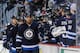 WINNIPEG, CANADA - DECEMBER 16: Evander Kane #9 of the Winnipeg Jets celebrates a third period goal against the Buffalo Sabres with teammates at the bench on December 16, 2014 at the MTS Centre in Winnipeg, Manitoba, Canada. (Photo by Lance Thomson/NHLI
