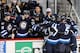 WINNIPEG, CANADA - DECEMBER 16: Michael Frolik #67 of the Winnipeg Jets gets mobbed by teammates at the bench after scoring a short-handed goal against the Buffalo Sabres on December 16, 2014 at the MTS Centre in Winnipeg, Manitoba, Canada. (Photo by Lan