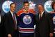 Jun 27, 2014; Philadelphia, PA, USA; Leon Draisaitl poses for a photo with team officials after being selected as the number three overall pick to the Edmonton Oilers in the first round of the 2014 NHL Draft at Wells Fargo Center. Mandatory Credit: Bill S