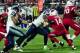 Dec 21, 2014; Glendale, AZ, USA; Arizona Cardinals quarterback Ryan Lindley (14) is sacked by Seattle Seahawks defensive end O'Brien Schofield (93) during the first half at University of Phoenix Stadium. Mandatory Credit: Matt Kartozian-USA TODAY Sports