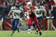 GLENDALE, AZ - DECEMBER 21: Running back Marshawn Lynch #24 of the Seattle Seahawks runs with the football to score 79 yard touchdown in the fourth quarter during the NFL game at the University of Phoenix Stadium on December 21, 2014 in Glendale, Arizona