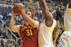 Feb 10, 2014; Morgantown, WV, USA; Iowa State Cyclones forward Georges Niang (31) being guarded by West Virginia Mountaineers forward Devin Williams (5) at WVU Coliseum. Mandatory Credit: Dan Friend-USA TODAY Sports West Virginia Wins 102 - 77