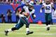 EAST RUTHERFORD, NJ - DECEMBER 28: Mark Sanchez #3 of the Philadelphia Eagles runs the ball against the New York Giants during a game at MetLife Stadium on December 28, 2014 in East Rutherford, New Jersey. (Photo by Al Bello/Getty Images)