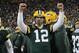 Dec 28, 2014; Green Bay, WI, USA; Green Bay Packers quarterback Aaron Rodgers (12) reacts after officials ruled a 2-point conversion attempt by the Detroit Lions failed in the fourth quarter at Lambeau Field. Mandatory Credit: Benny Sieu-USA TODAY Sports