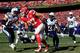 KANSAS CITY, MO - DECEMBER 28: Tight end Travis Kelce #87 of the Kansas City Chiefs recovers a ball fumbled by wide receiver Dwayne Bowe #82 in the end zone for a touchdown during the game against the San Diego Chargers at Arrowhead Stadium on December 2